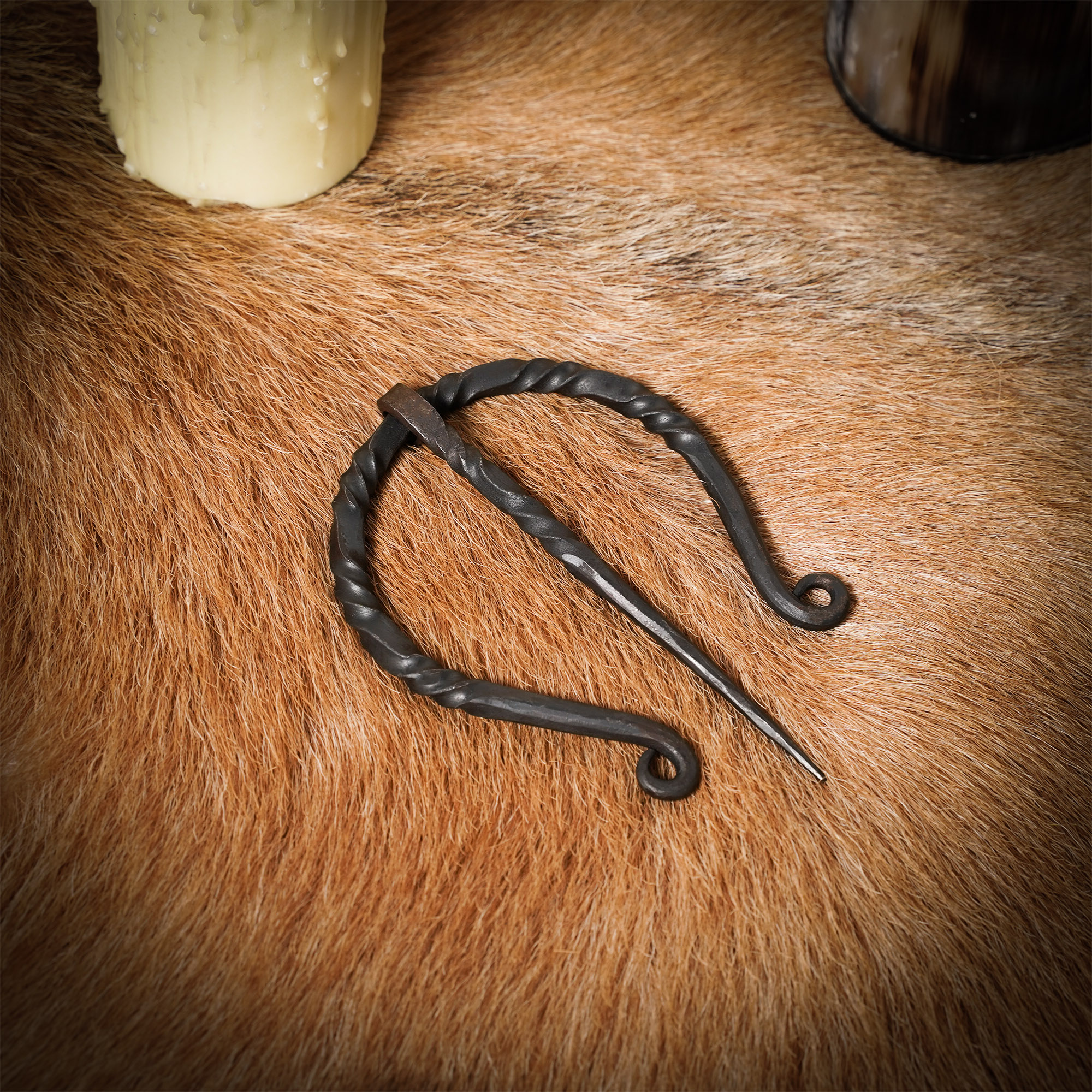 made a metal cloak pin from some old horse gear : r/LARP